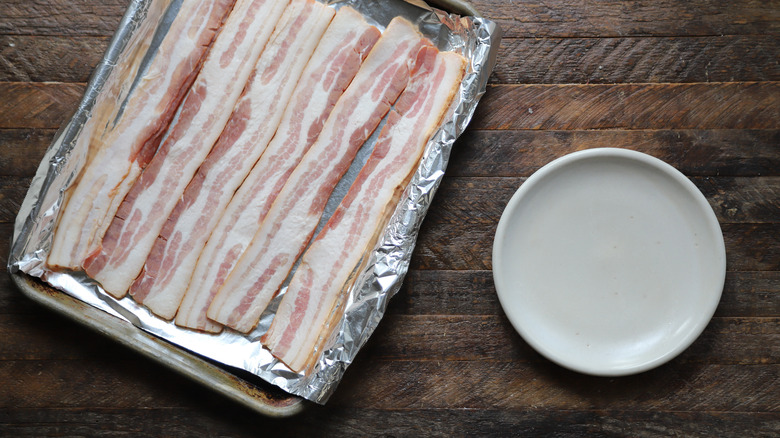 Sheet tray with raw bacon