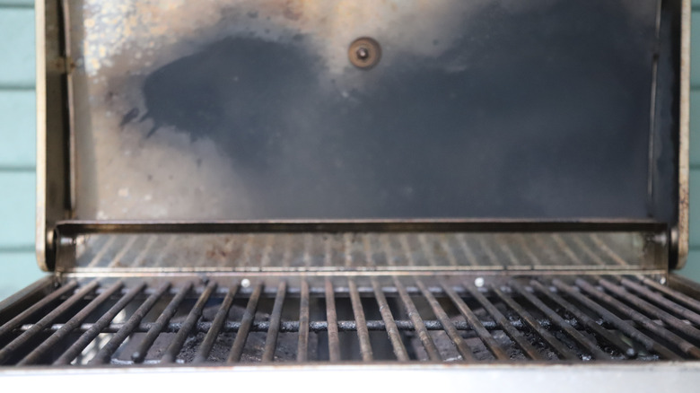 Gas grill preheating outdoors