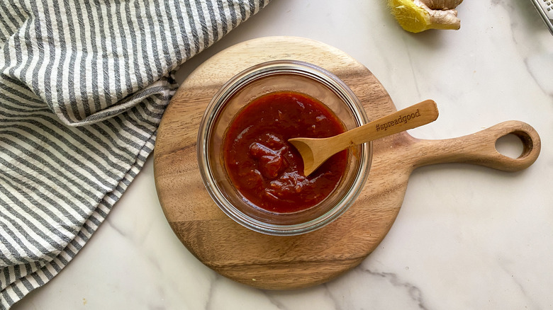 tonkatsu sauce in jar on round board