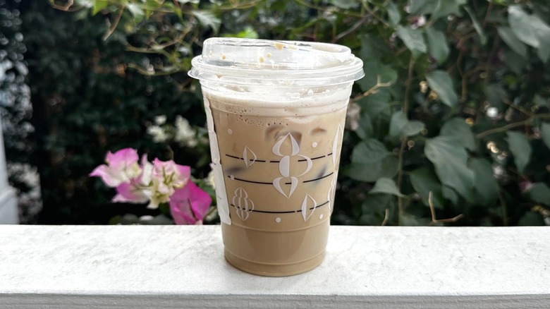 Starbucks secret menu Iced Gingerbread Chai Latte drink in clear cup