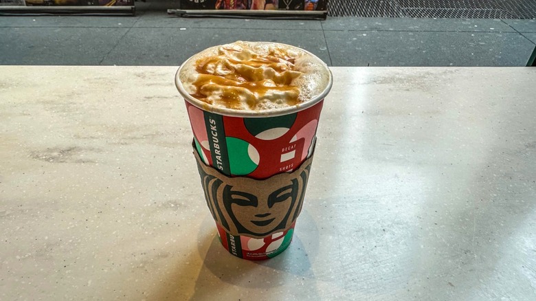 Starbucks secret menu Roasted Toasted Nut Macchiato drink in holiday cup