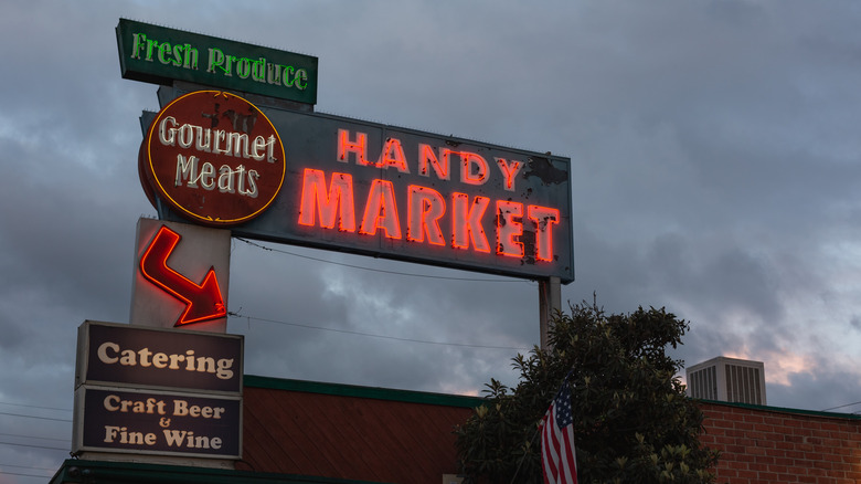 Burbank's Handy Market sign on a cloudy day