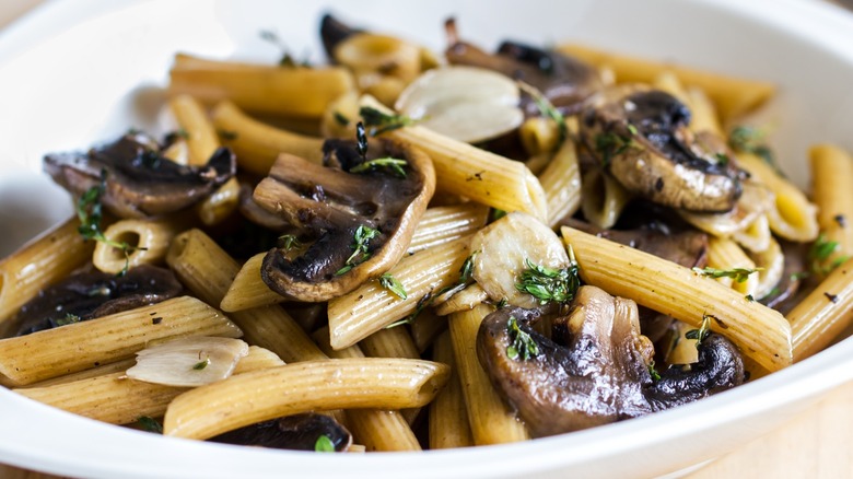 Close-up of mushroom and penne pasta