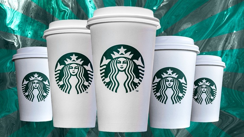 lineup of Starbucks cups