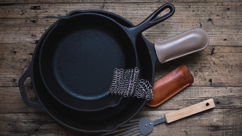 stack of cast iron skillets