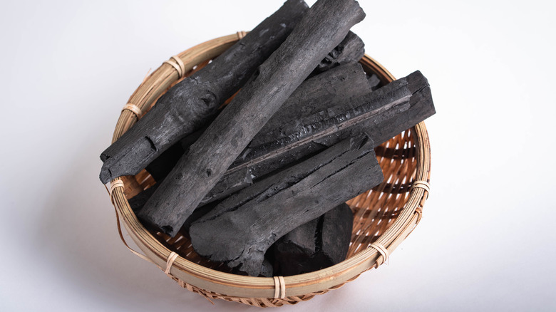 binchotan charcoal contained in basket