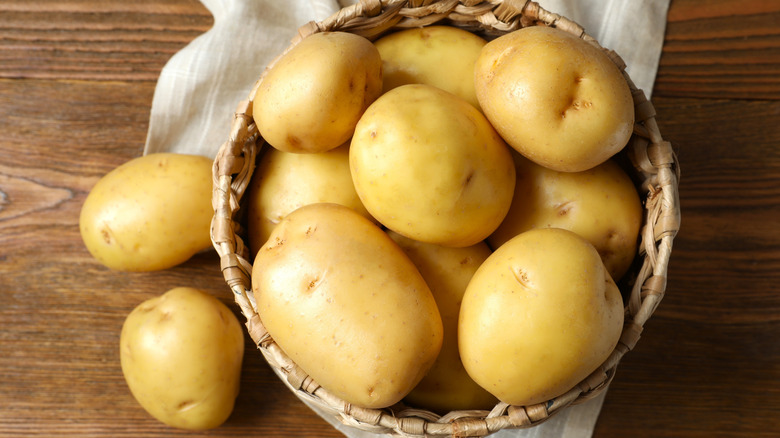 Gold potatoes in basket