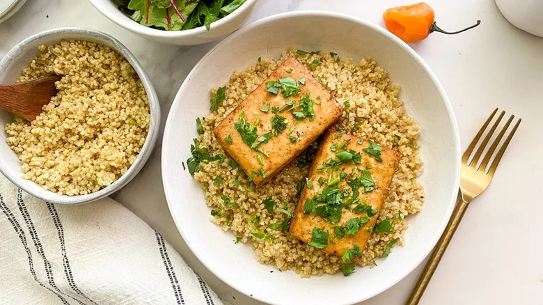 Marinated tofu in bowl with couscous