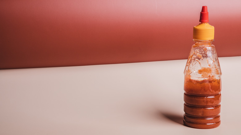 hot sauce in unlabeled bottle