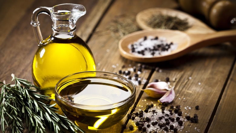 table of olive oil and herbs