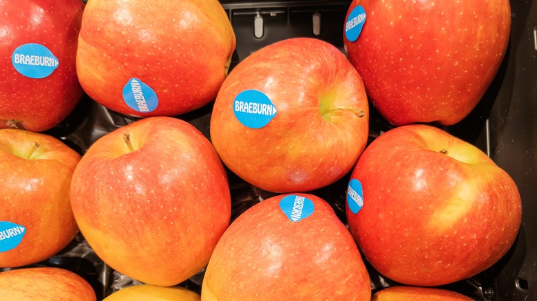 Braeburn apples with stickers