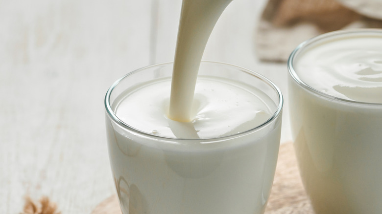 Buttermilk being poured into glass