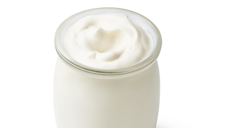 Glass jar of Greek yogurt 