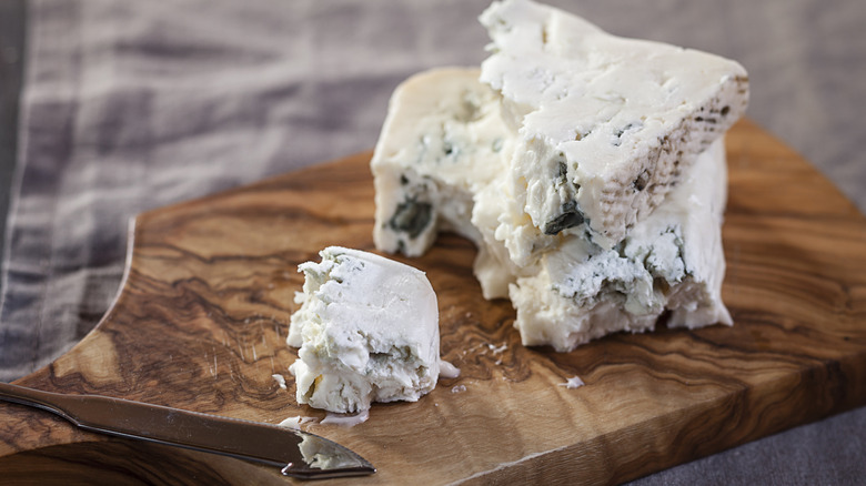 blue cheese on wooden board