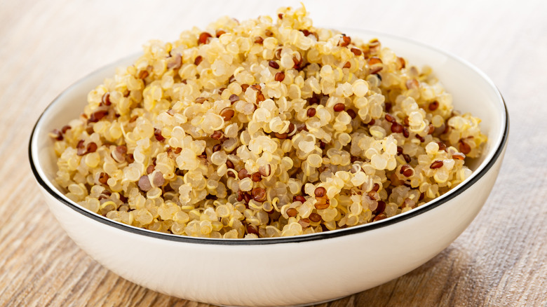 cooked quinoa in a blue and white serving bowl