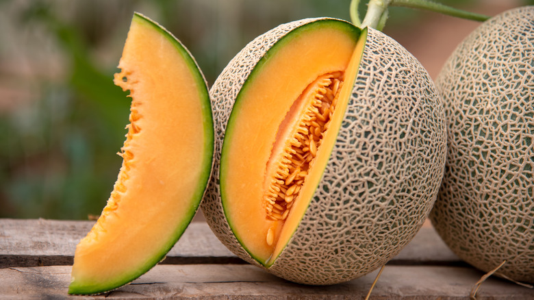 Cantaloupes on a wooden table