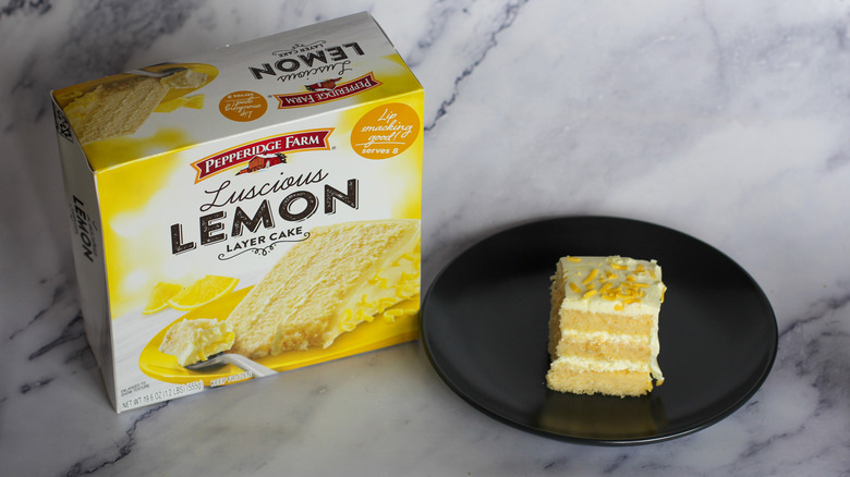 Lemon layer cake on table