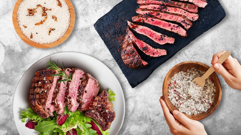 plated sliced steak with bowls of finishing salt