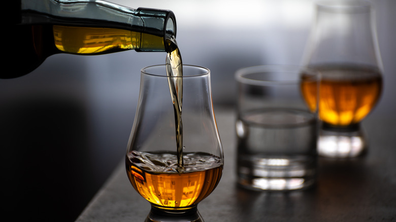 Scotch being poured into glass