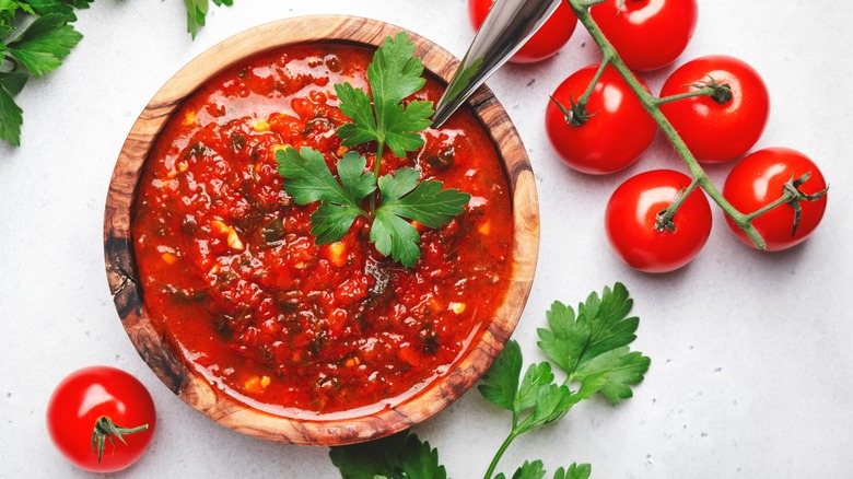 Arrabbiata sauce next to tomatoes