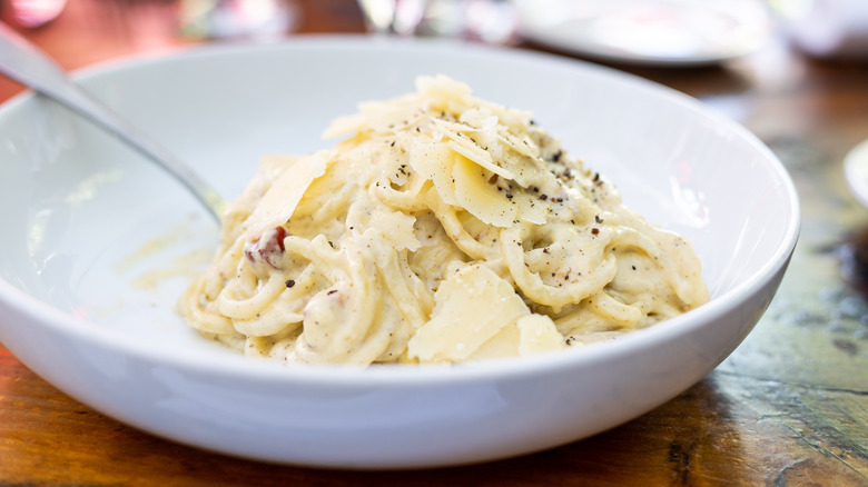 alfredo sauce with parmesan shavings