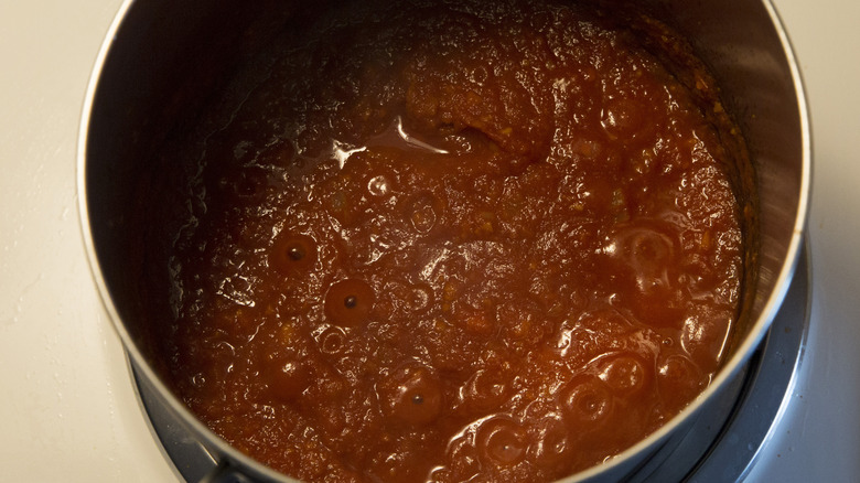 tomato sauce simmering in pan 