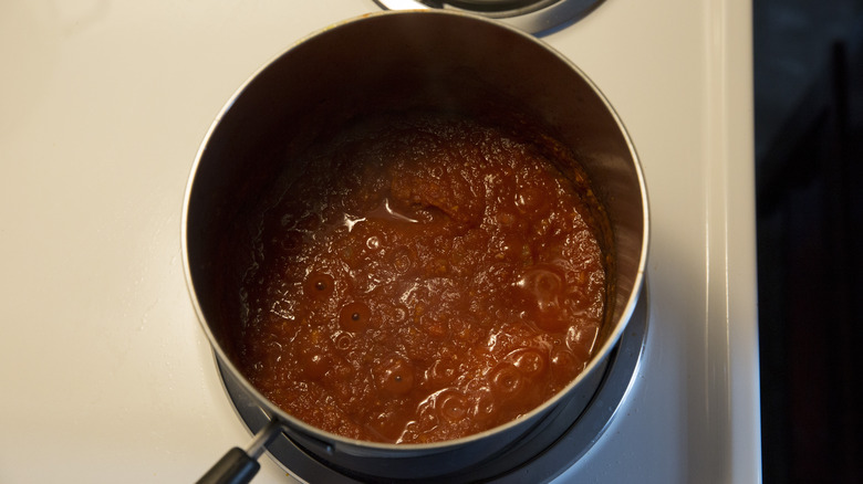 tomato sauce simmering in pan 