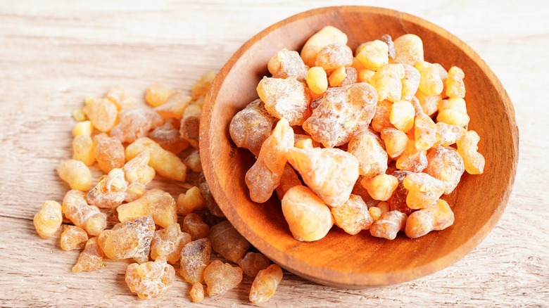 gum arabic in wooden bowl