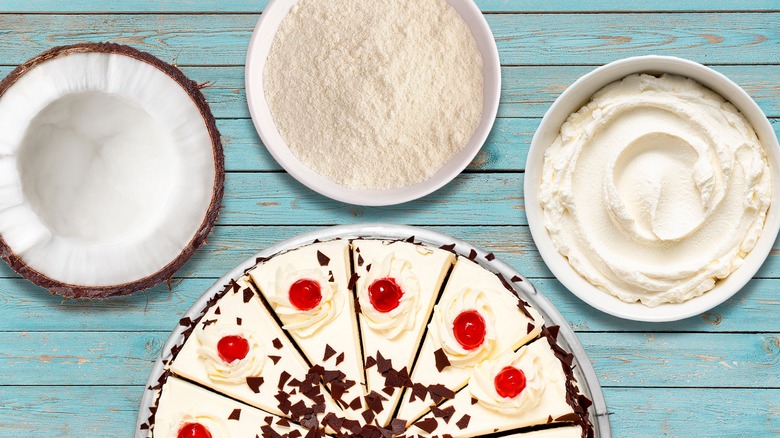 Coconut, milk powder, and cream alongside a pie