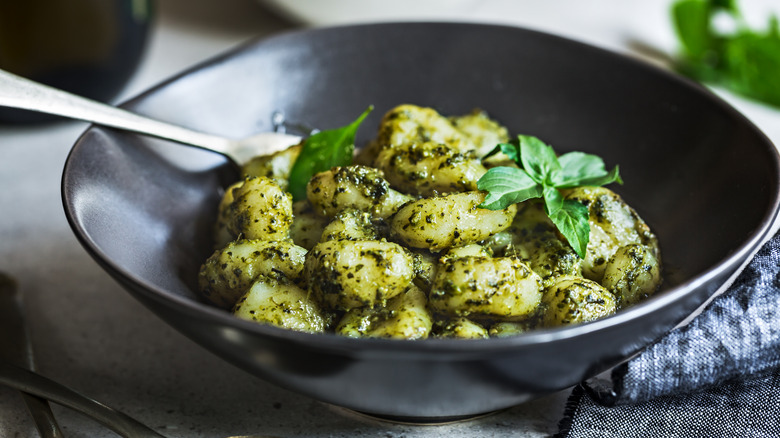 bowl of green pesto gnocchi