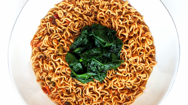 ramen topped with spinach