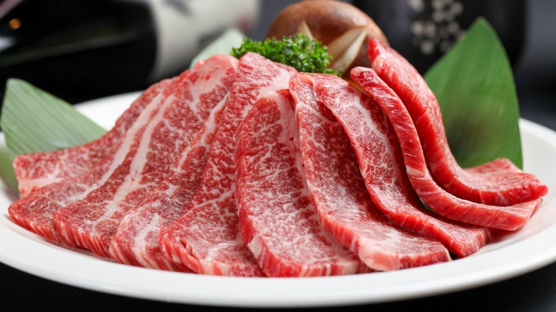 sliced japanese wagyu on serving plate