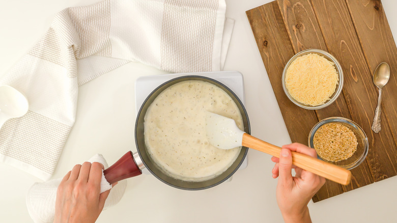 Alfredo sauce in pan