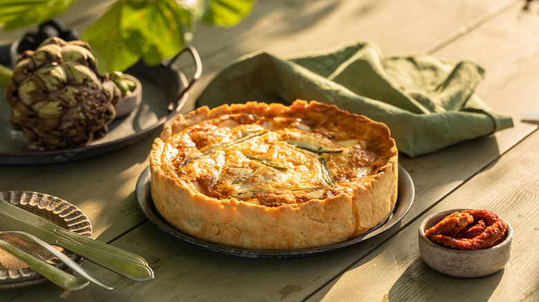 Plated quiche, artichokes