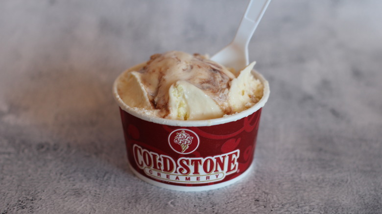 Boston cream pie ice cream flavor in a cold stone creamery cup