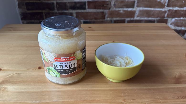 Silver Floss Shredded Kraut on wooden table and in bowl