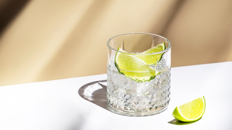 cocktail with lime garnish