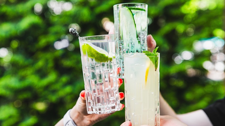 cheering three different cocktails