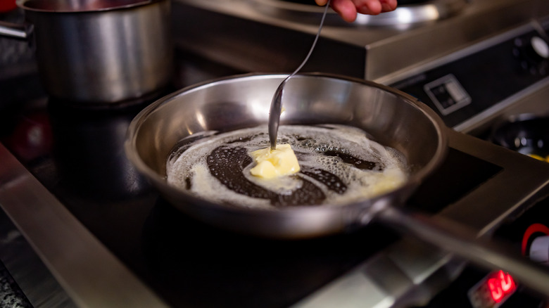 butter melting in pan