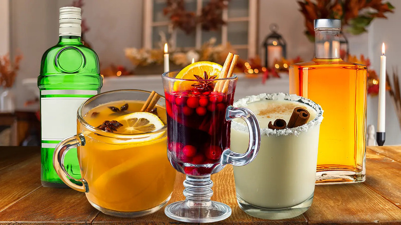 various beverages and cocktails on wooden table