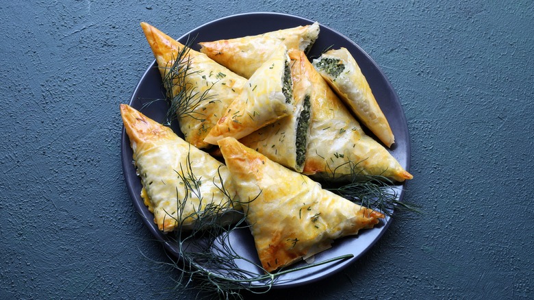 Spinach triangles on plate