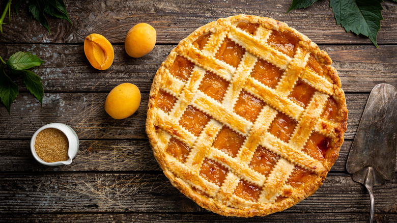 Baked fruit pie on table