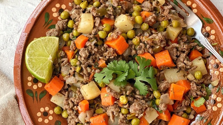 picadillo served in clay bowl