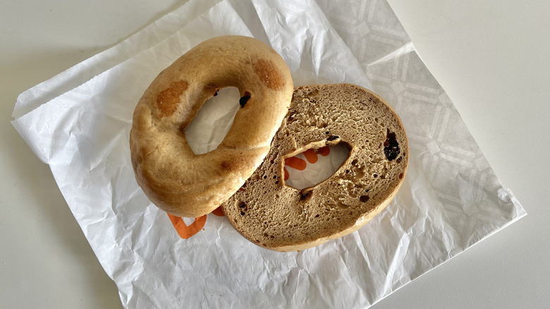 Dunkin' cinnamon raisin bagel on napkin