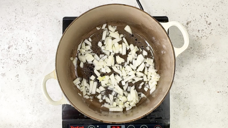 onion frying in pan