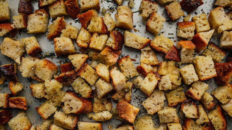 croutons crowded on baking sheet