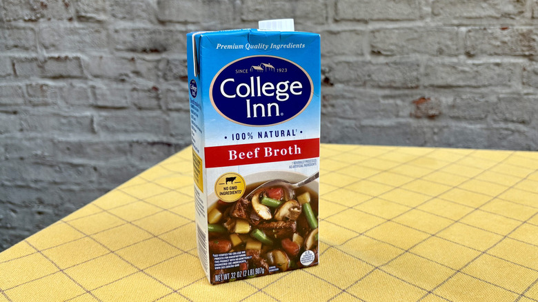 College Inn beef broth carton on yellow tablecloth