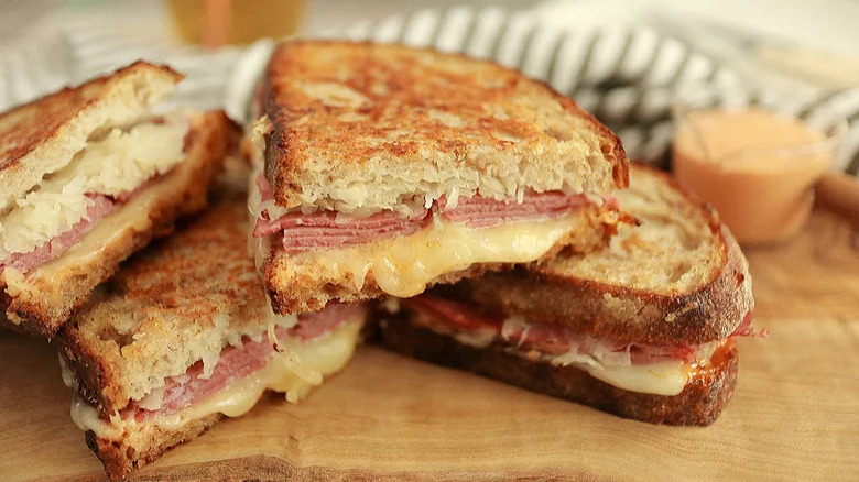 classic Reuben sandwich cut crosswise