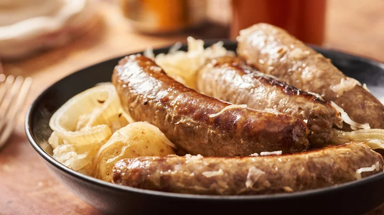 brats and sauerkraut on plate