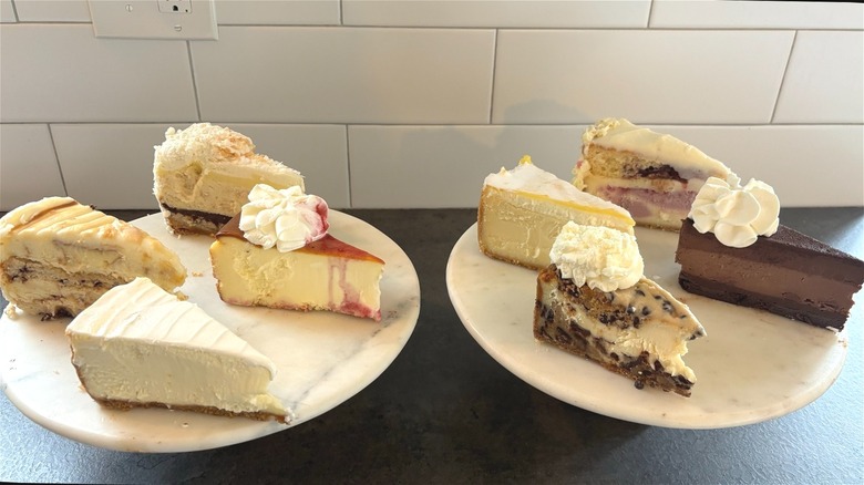 8 cheesecakes on marble platter